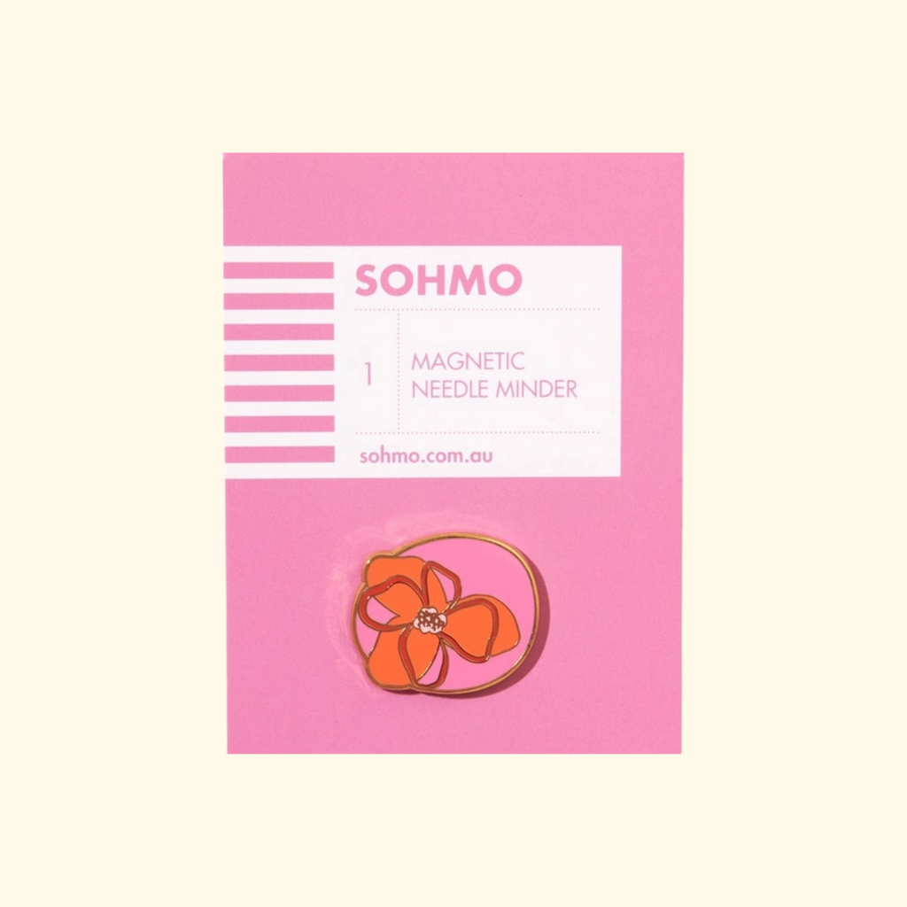 Abstract Flowers Magnetic Needle Minder by SOHMO in pink packaging with colourful abstract flower design