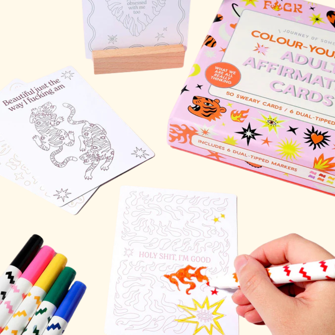 Person colouring Journey Of Something affirmation cards with bright markers and positive affirmation prompts