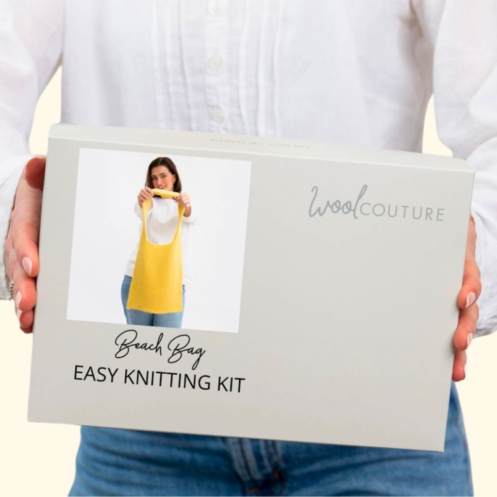 Gift box packaging for the Wool Couture Beach Bag Knitting Kit featuring the finished bag design.