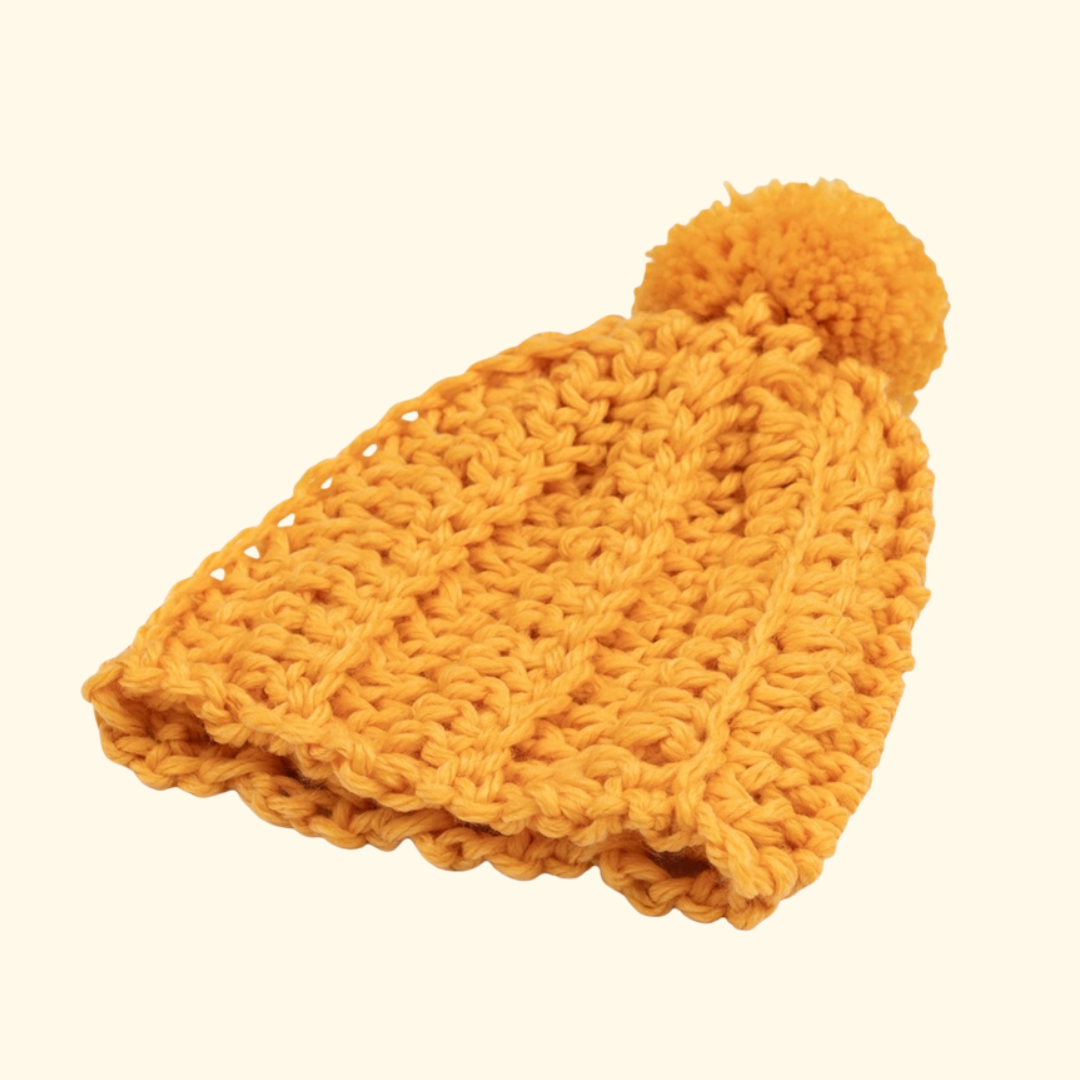 Completed crocheted beanie made with the Wool Couture Beanie Crochet Kit.
