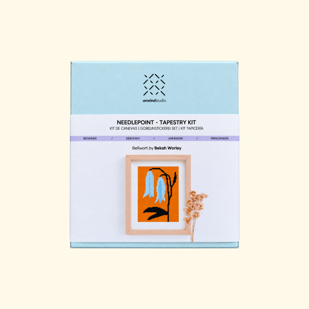 Bellwort Needlepoint Kit by Unwind Studio with printed canvas and product packaging