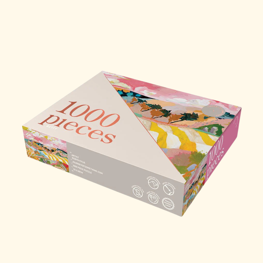 Betty 1000 Piece Puzzle packaging and puzzle pieces styled for gifting and screen free creativity
