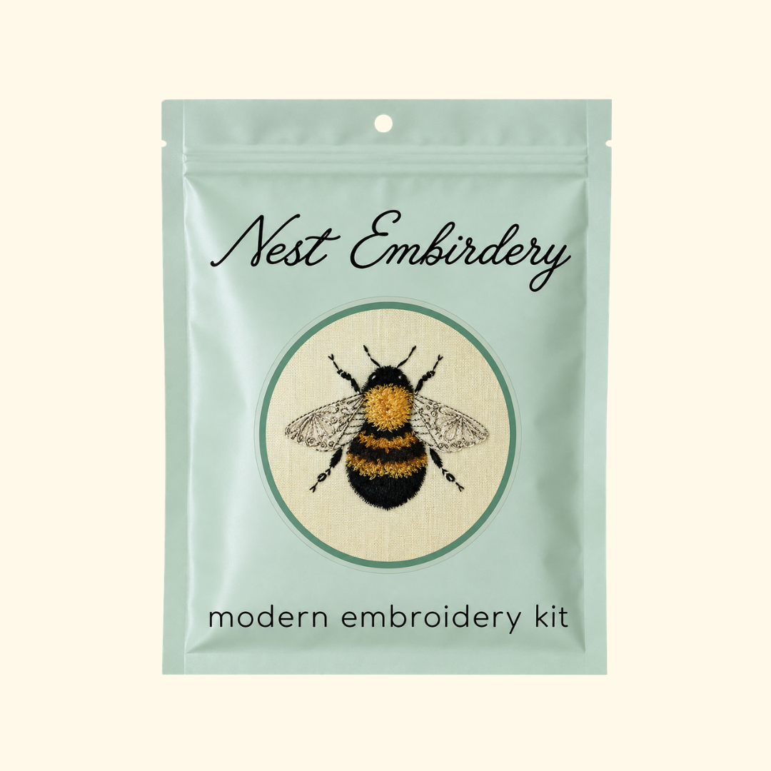 Nest Embirdery Bumblebee Mini Embroidery Kit packaging featuring the completed bee design.