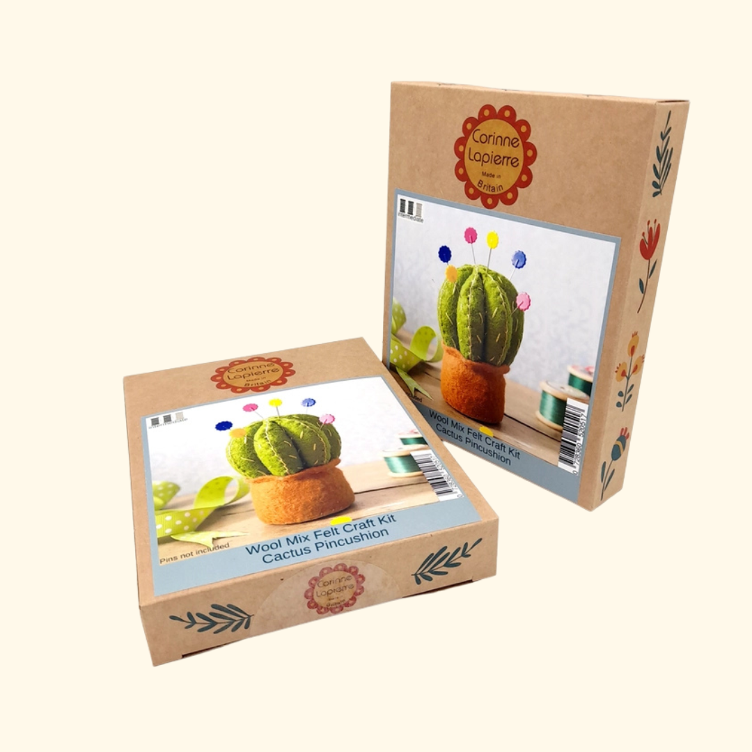 Cactus Pincushion Felt Craft Kit by Corinne Lapierre with both the box packaging and completed felt cactus pincushion displayed together.