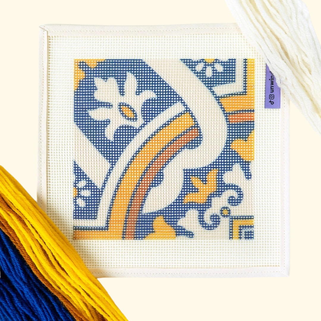 Pre-printed needlepoint canvas featuring the blue, white and yellow Cedofeita Portuguese tile design.