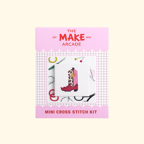 Cowgirl Boot Mini Cross Stitch Kit packaging by The Make Arcade showing the finished cowboy boot design.