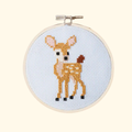 Completed deer cross stitch design stitched in an embroidery hoop by Cotton Clara.