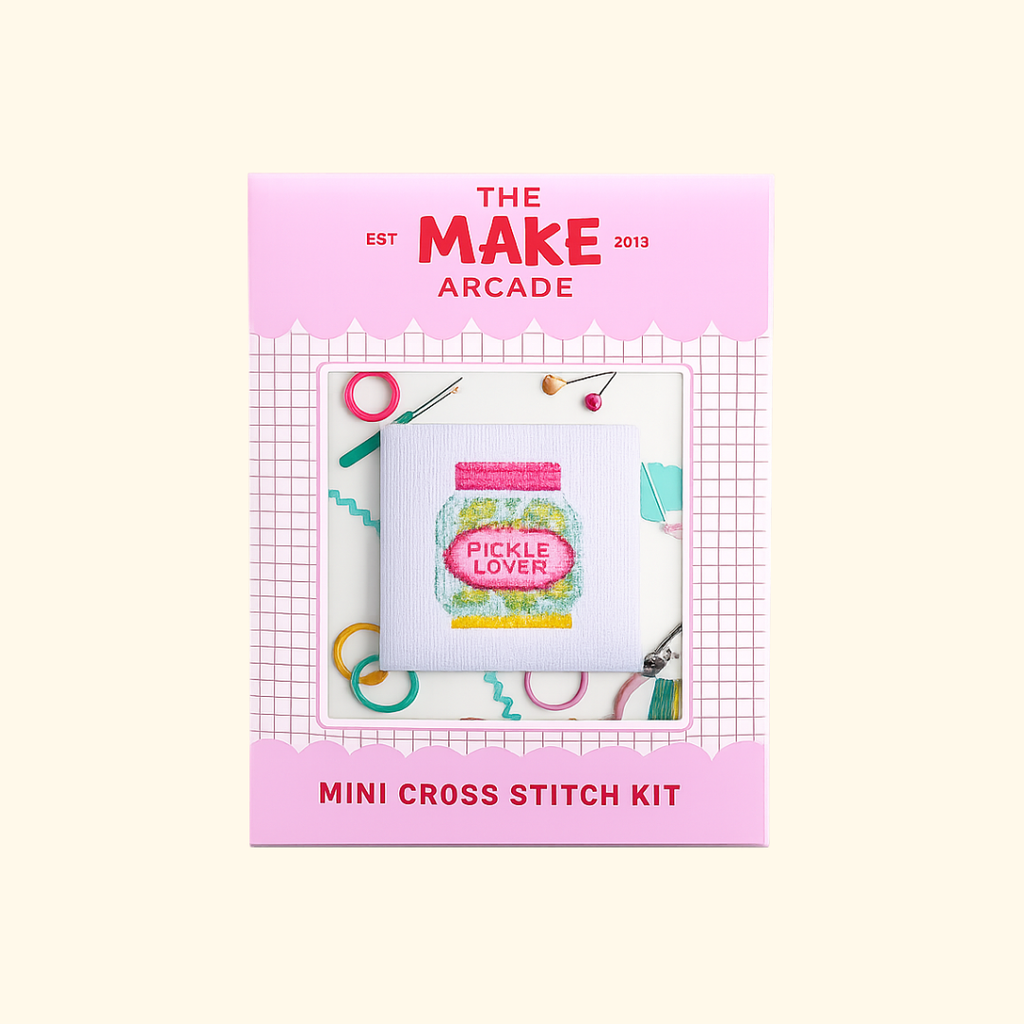 Dill Pickle Mini Cross Stitch Kit packaging by The Make Arcade showing the finished pickle jar design.