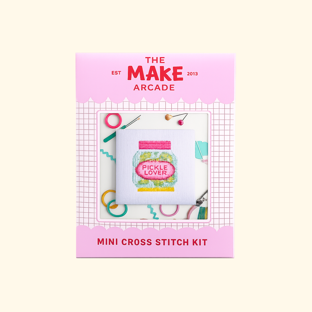 Dill Pickle Mini Cross Stitch Kit packaging by The Make Arcade showing the finished pickle jar design.