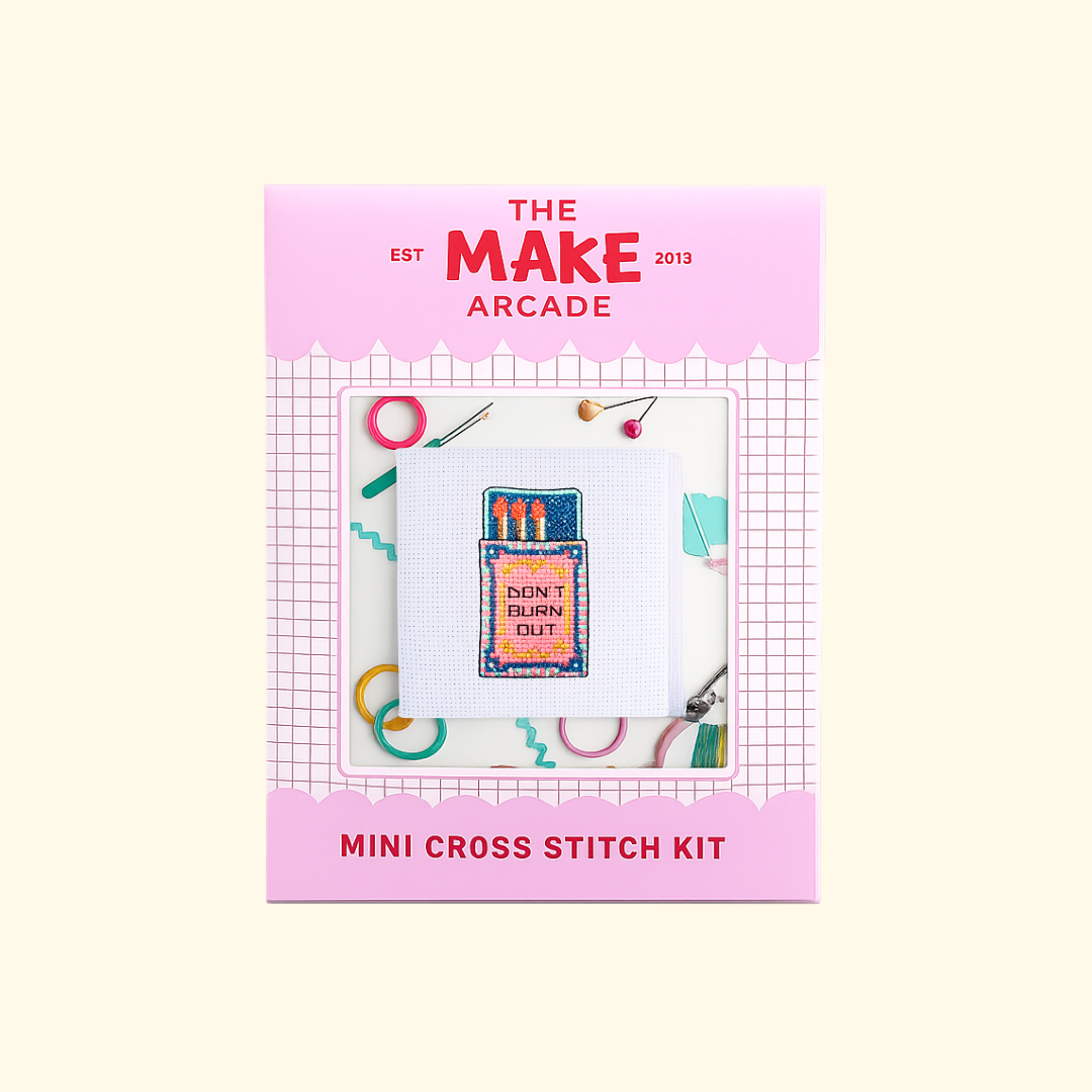 Flamin Hot Mini Cross Stitch Kit packaging by The Make Arcade showing the finished hot sauce bottle design.