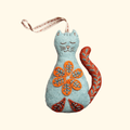 Finished Folk Cat felt craft kit by Corinne Lapierre displayed against a plain background.