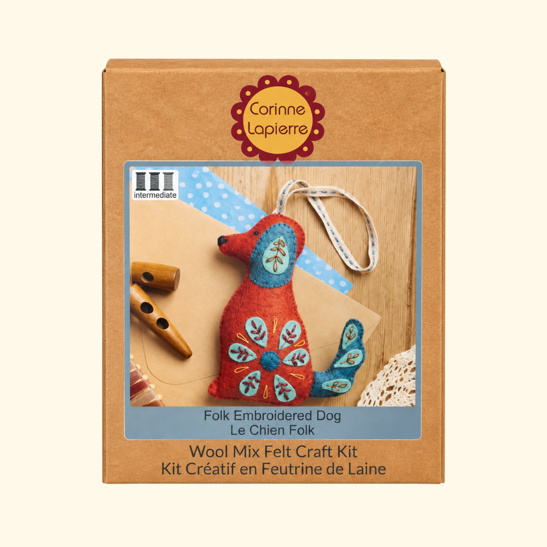 Corinne Lapierre Folk Dog Felt Craft Kit in kraft box featuring the finished embroidered dog design.