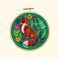 Finished Folk Fox mini embroidery hoop featuring a colourful folk art fox by Hawthorn Handmade.