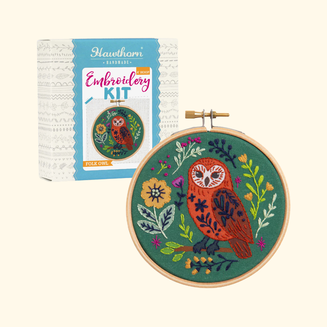 Hawthorn Handmade Folk Owl Mini Embroidery Kit box shown beside the finished embroidery hoop.