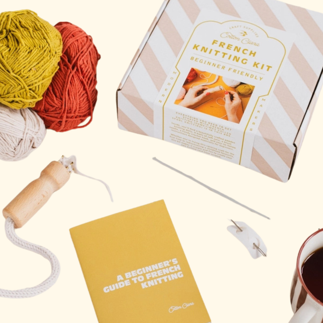 Cotton Clara French Knitting Kit gift box displayed with yarn and instruction booklet.