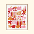 Finished Harvest Grid cross stitch featuring a modern botanical pattern in warm autumn tones displayed in a wooden frame.