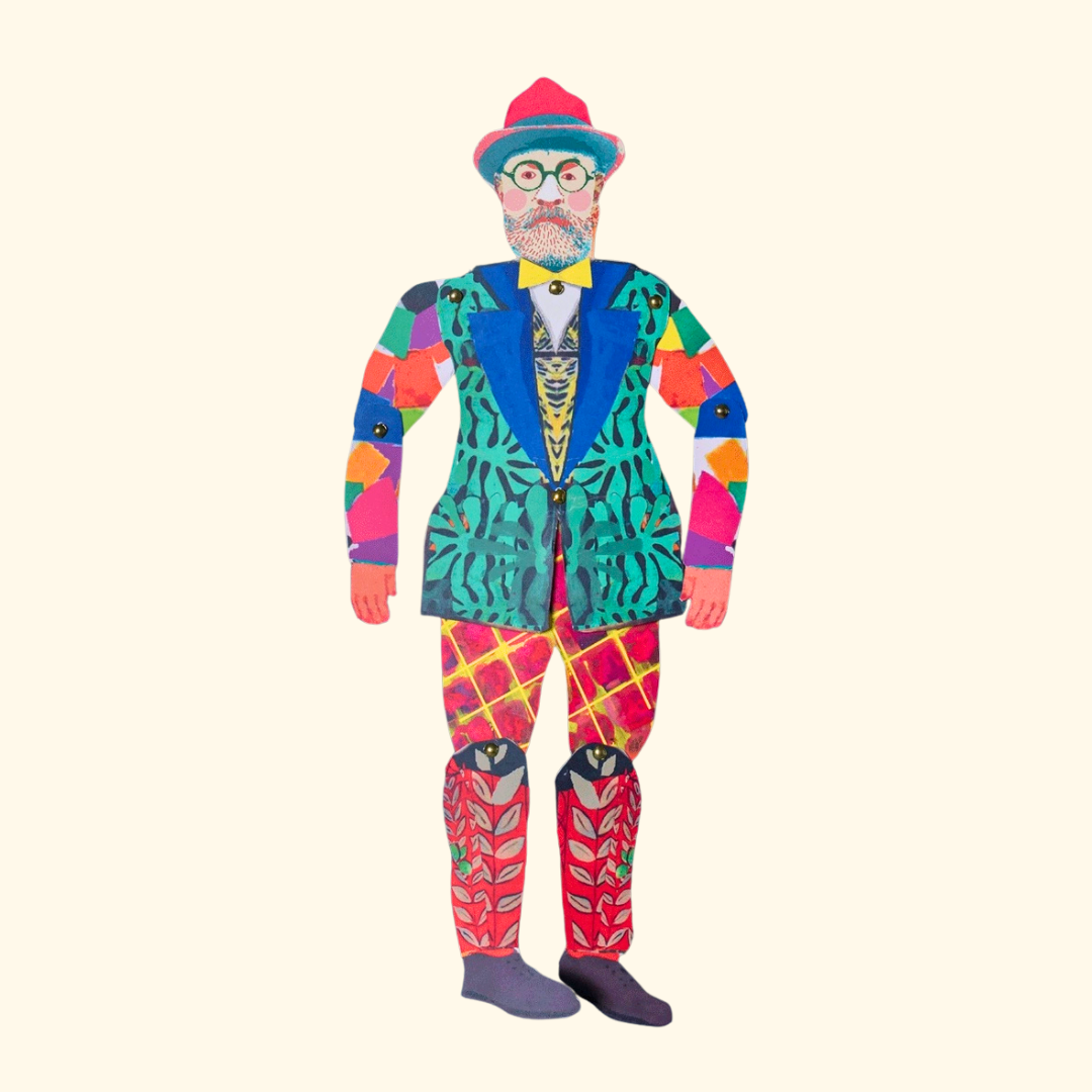 Completed Henri Matisse paper puppet wearing a colourful suit against a white background.