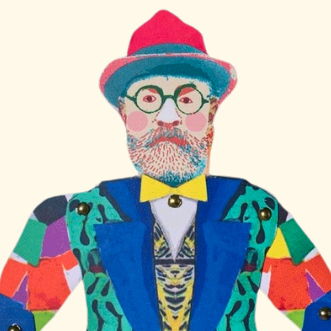 Close-up of the Henri Matisse paper puppet with glasses, grey beard, red hat and vibrant jacket.