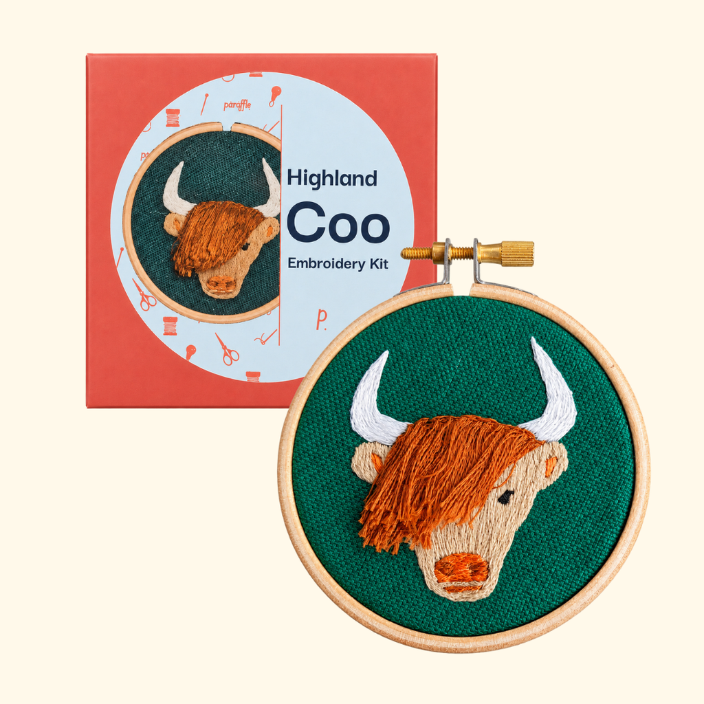 Paraffle Highland Coo Mini Embroidery Kit with packaging and finished hoop design.