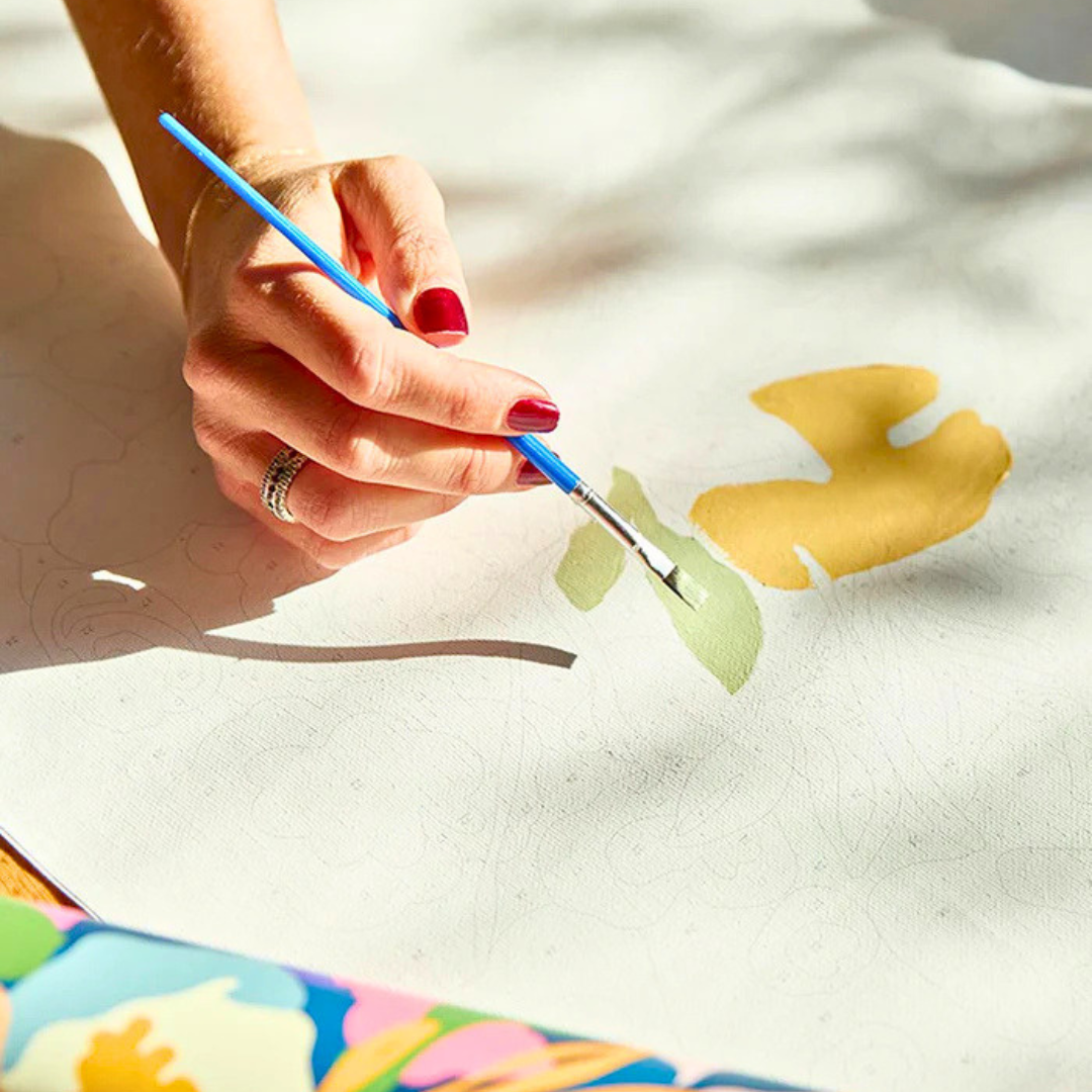 Hand painting the In Bloom floral paint by numbers artwork in progress