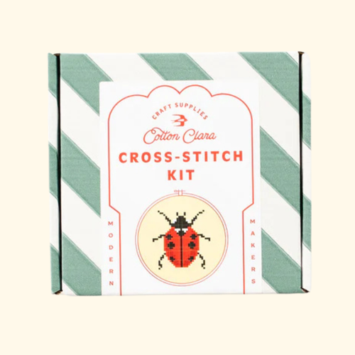 Cotton Clara Ladybird Cross Stitch Kit in striped gift box packaging.