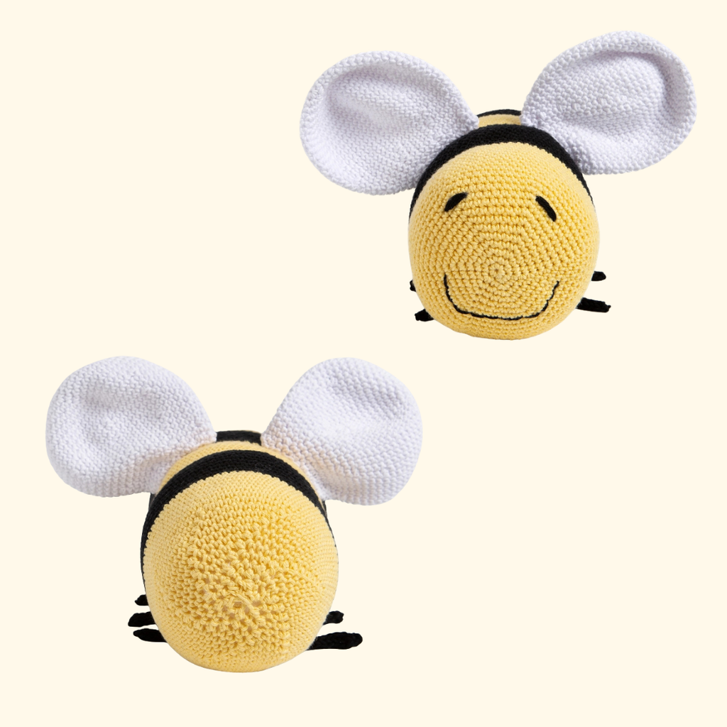 Close up of the completed Lewis the Bee crochet toy showing the textured stitches and wings.