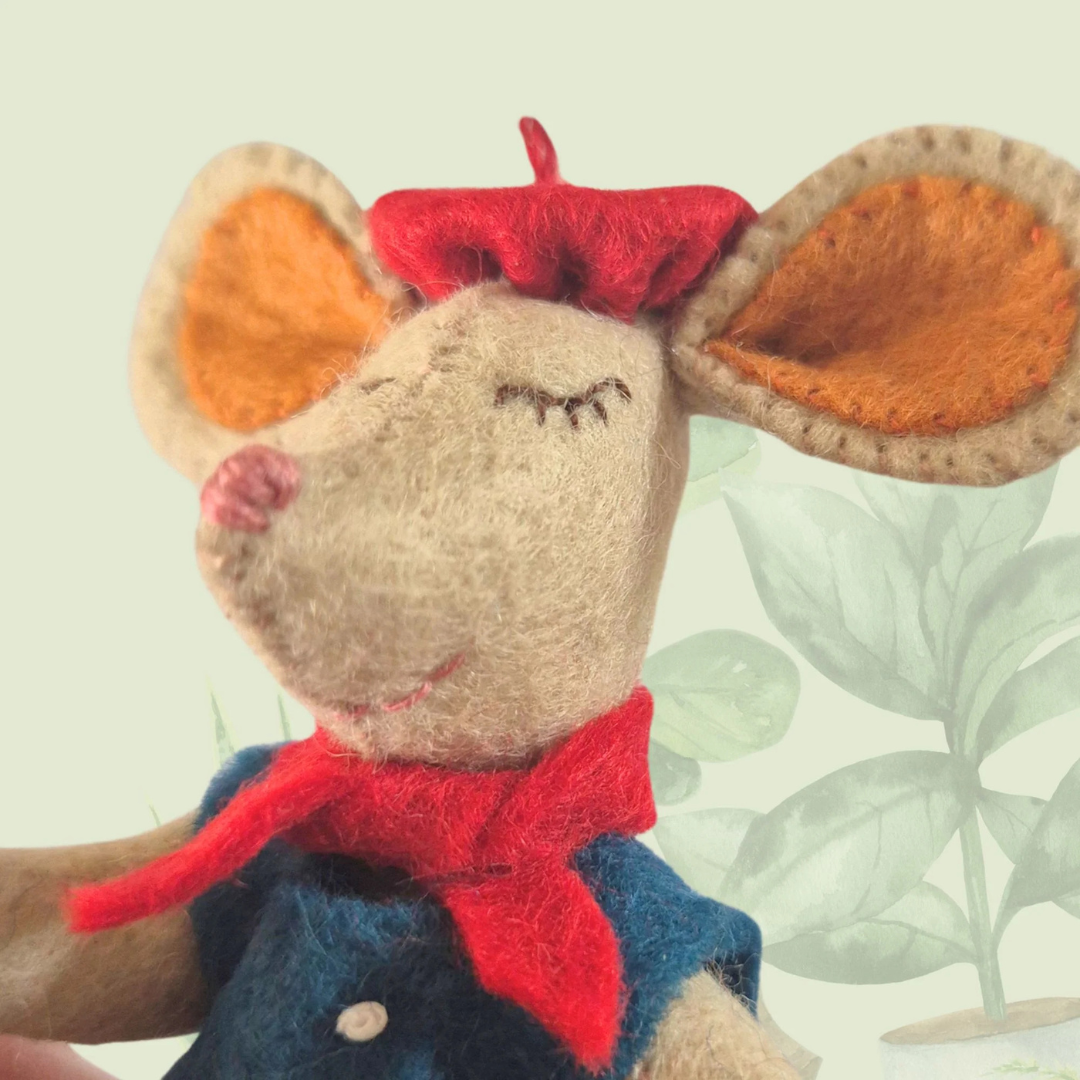 Close up of the embroidered face and scarf details on the Little Mouse In Paris felt craft kit by Corinne Lapierre.