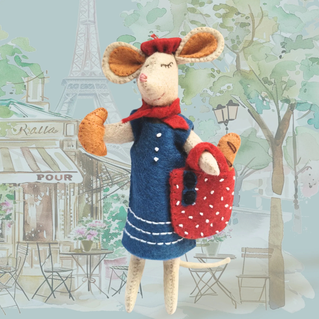 Finished Little Mouse In Paris felt craft kit by Corinne Lapierre displayed in a styled setting.