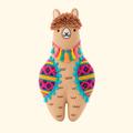 Finished Llama Embroidery Kit doll with colourful geometric stitching and textured brown wool by Kiriki Press.