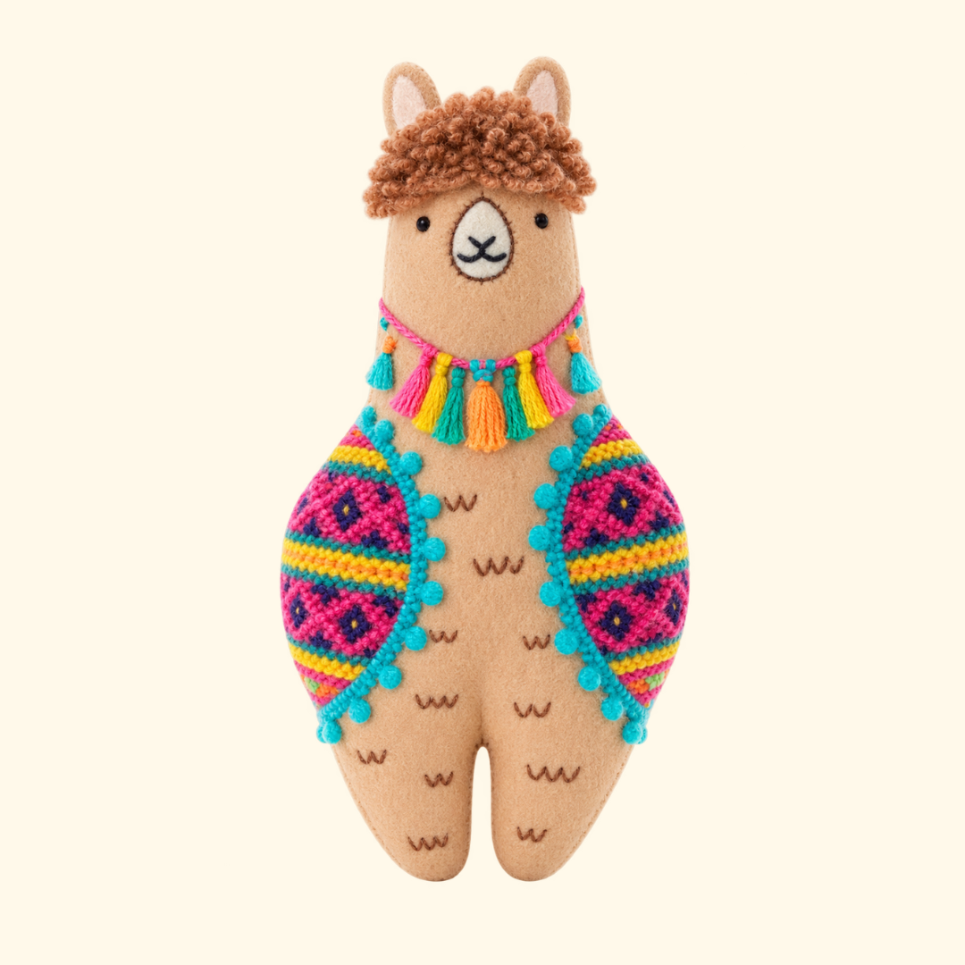 Finished Llama Embroidery Kit doll with colourful geometric stitching and textured brown wool by Kiriki Press.