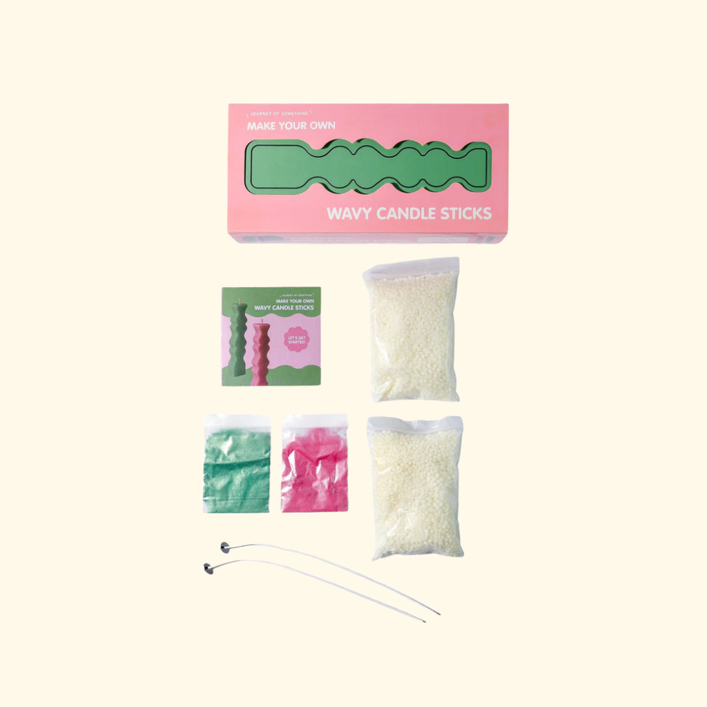DIY candle stick decorating kit with dyes, wicks and materials.