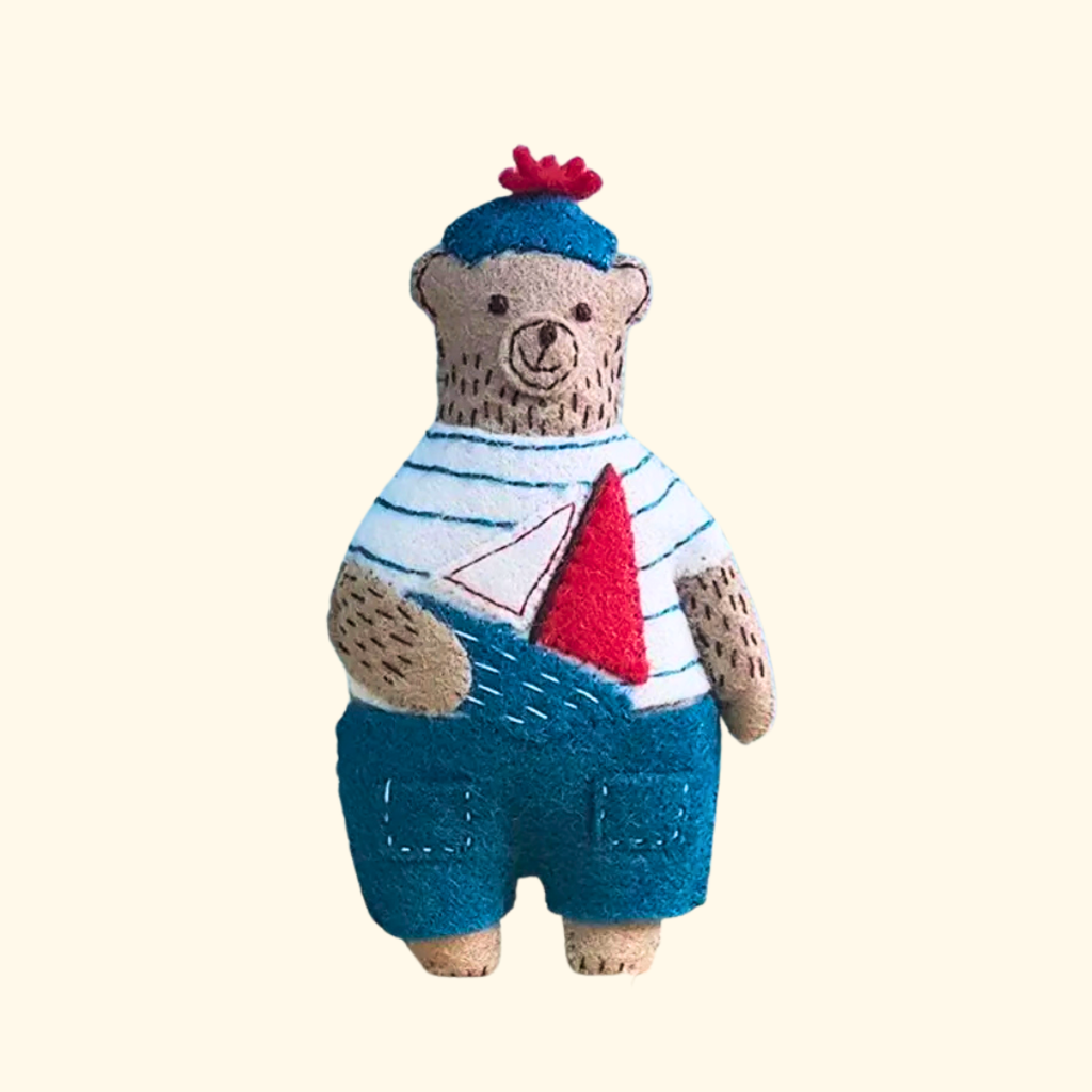 Finished Marcel the Sailor Bear felt craft kit by Corinne Lapierre displayed against a plain background.