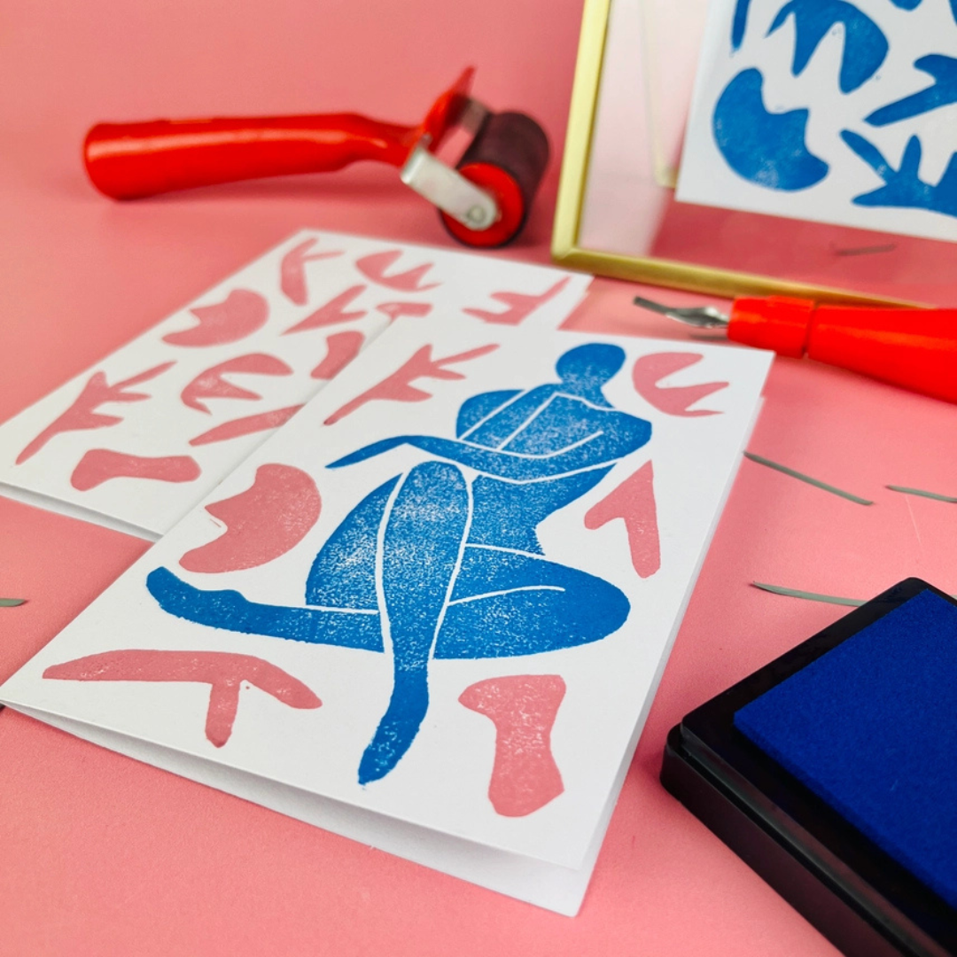 Lino printing in progress using carving tools, ink roller and printing block from The Edinburgh Craft Club kit.