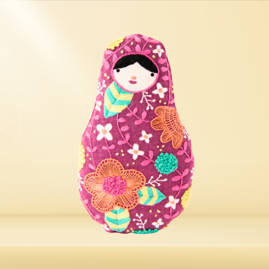Finished Matryoshka embroidery kit displayed on a surface