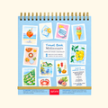 Mediterranean Watercolour Travel Book by La Petite Epicerie featuring a spiral-bound painting book with colourful Mediterranean-inspired illustrations of coastal scenery, citrus fruits and summer landscapes.