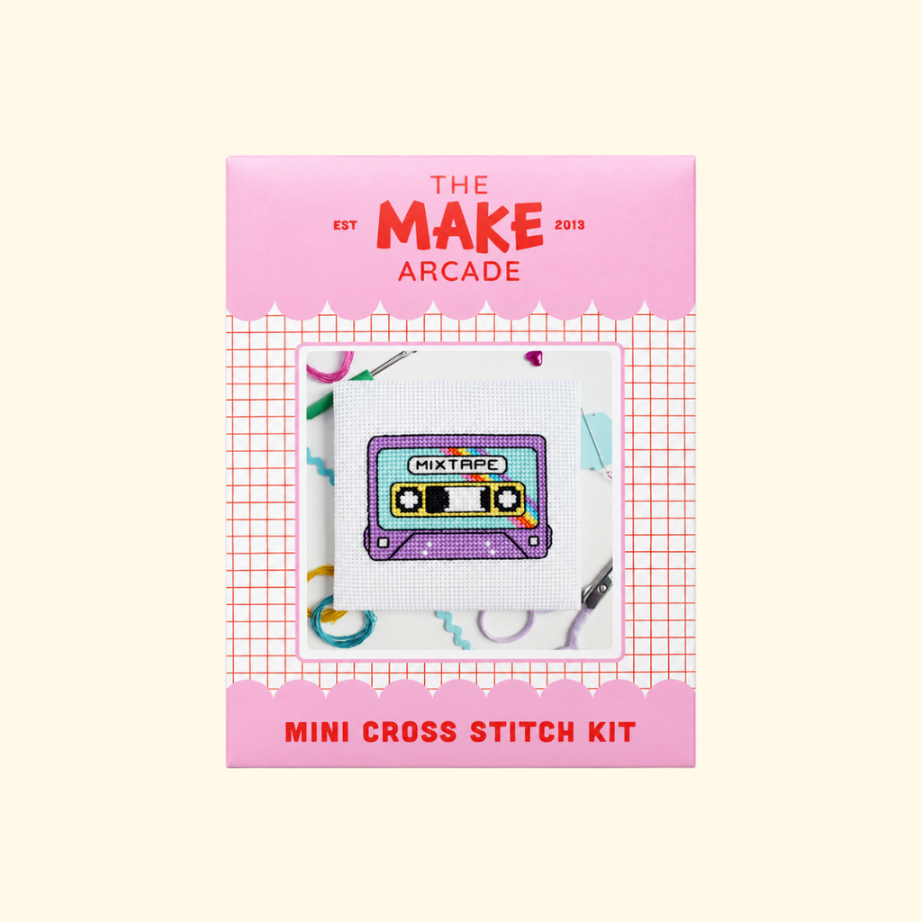 The Make Arcade Mixtape Mini Cross Stitch Kit in pink recyclable packaging.
