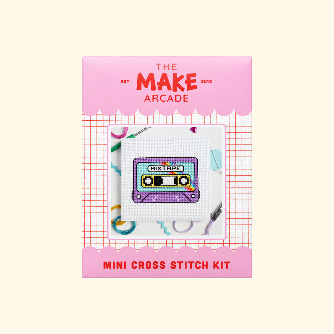 The Make Arcade Mixtape Mini Cross Stitch Kit in pink recyclable packaging.