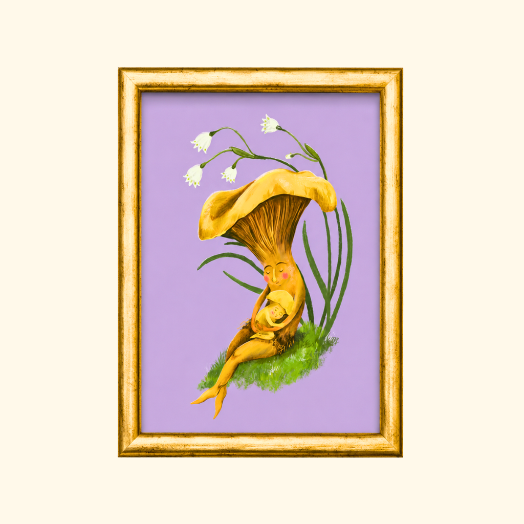 Mushroom Snuggles greeting card displayed in a gold frame, showcasing a charming illustration of a mother mushroom embracing her baby on a soft lavender background.