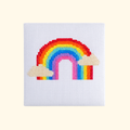 Completed Over The Rainbow Mini Cross Stitch Kit featuring a colourful rainbow with fluffy clouds by The Make Arcade.