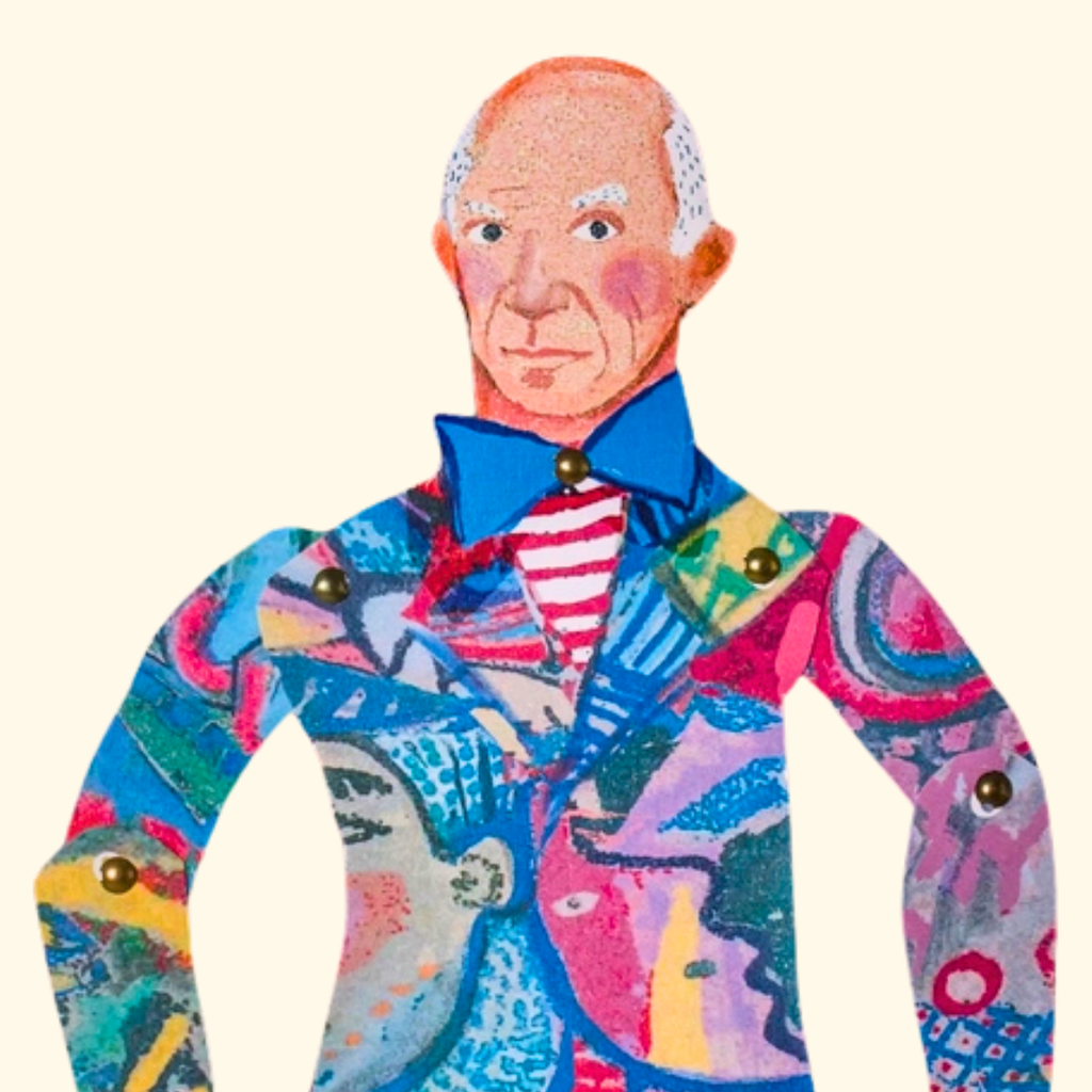 Close-up of the Pablo Picasso paper puppet featuring a colourful abstract suit and red striped shirt.