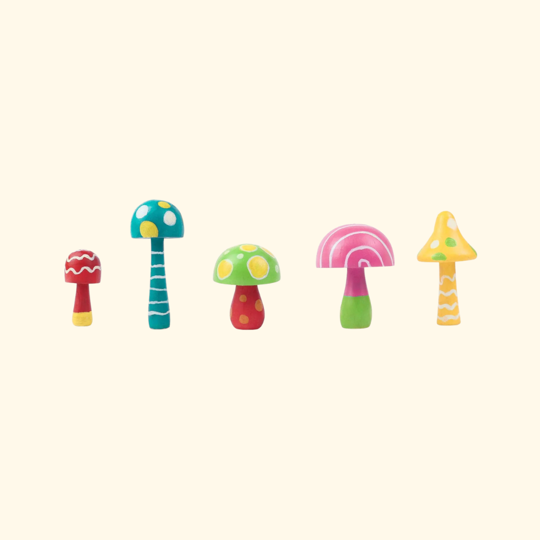 Finished wooden mushrooms decorated with colourful patterns and designs.