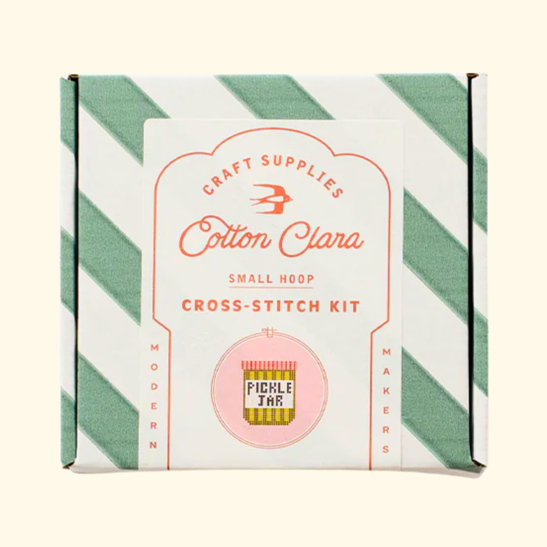 Cotton Clara Pickle Jar Cross Stitch Kit in striped gift box packaging.