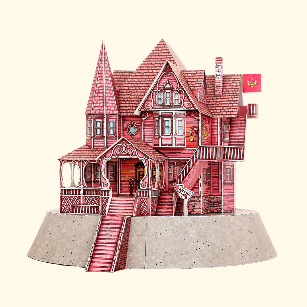 Completed Pink Palace Apartments paper model kit by Kiko Ilustrador, featuring Coraline's iconic pink Victorian house with detailed roof, windows and front steps.
