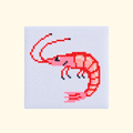 Completed red prawn cross stitch design on white Aida fabric.