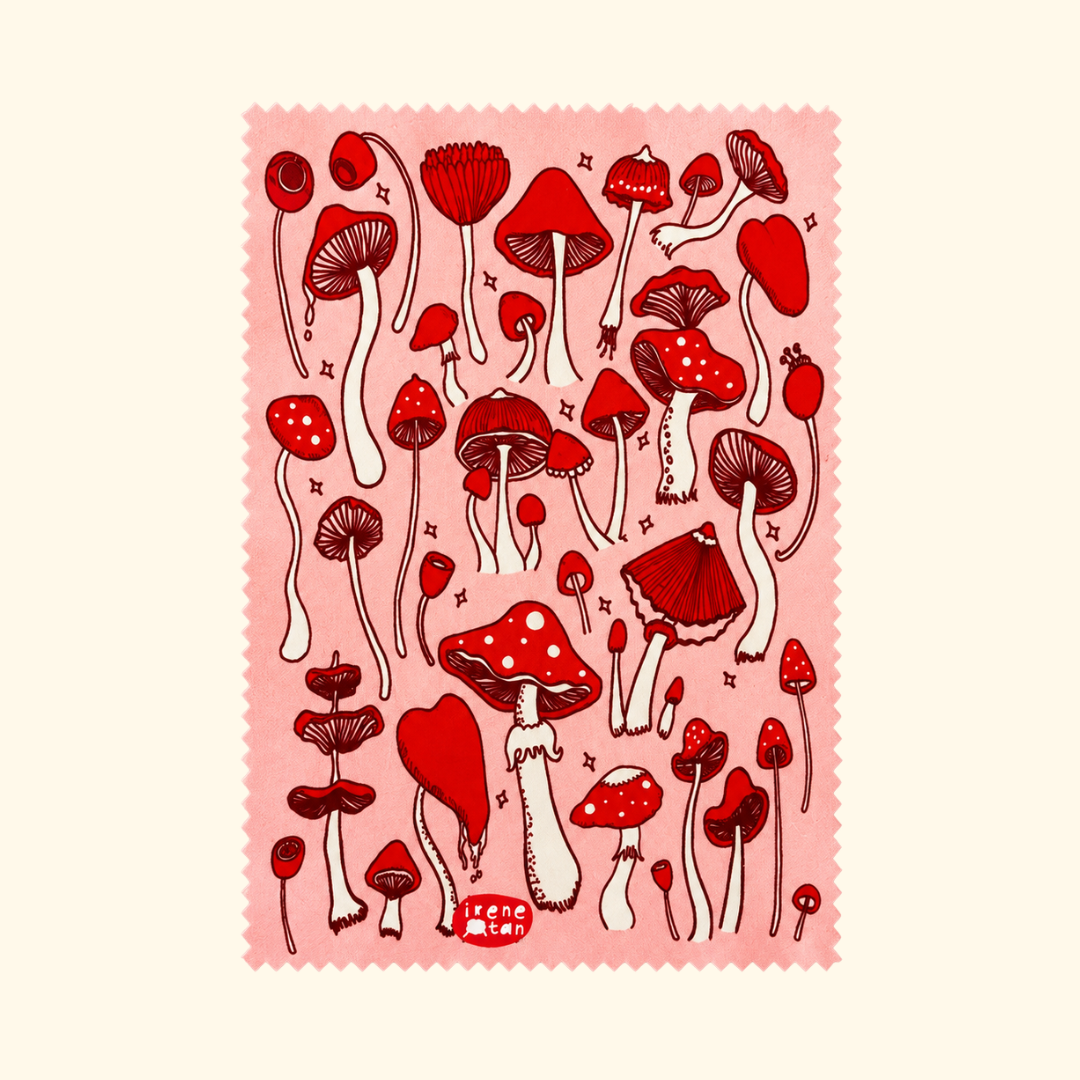 Red Mushroom microfibre cloth by Missy Minzy featuring a playful pattern of red and pink illustrated mushrooms.