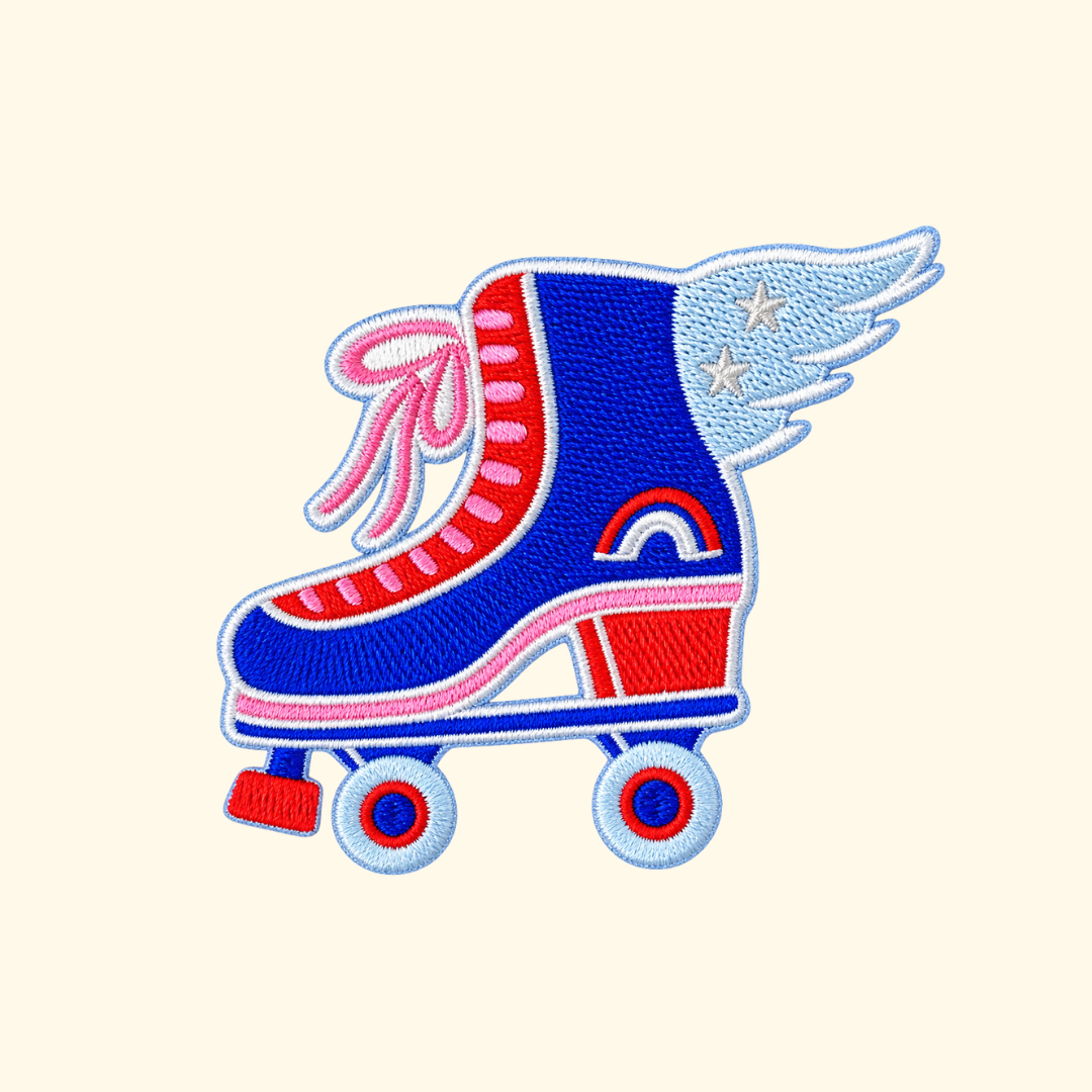 Colourful red, blue and white retro roller skate embroidered iron on patch designed by Melbourne artist Missy Minzy.