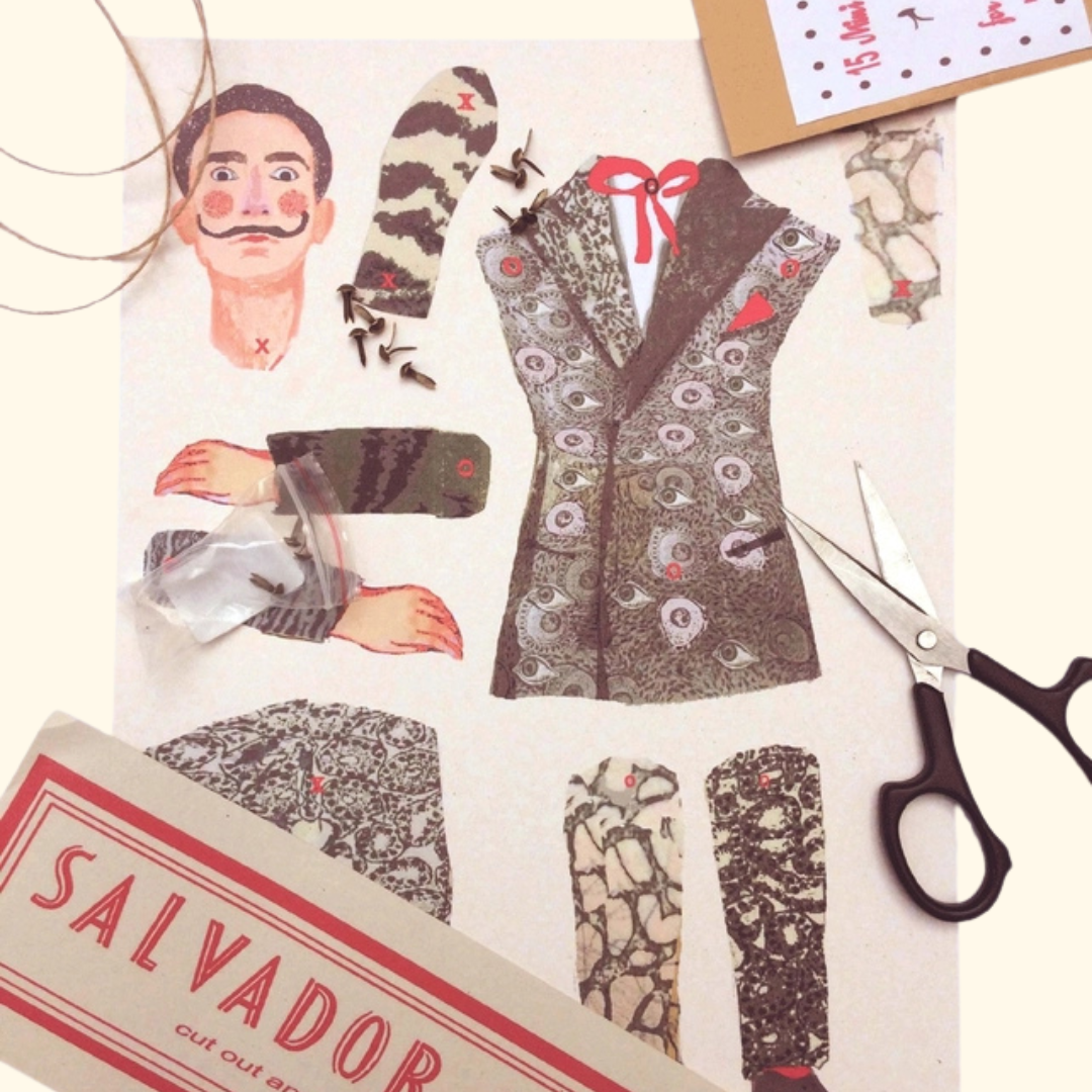 Salvador Dali Cut & Make Paper Puppet Kit contents with illustrated pieces and scissors