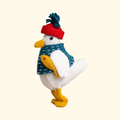 Sam the Seagull felt craft kit by Corinne Lapierre showing the completed seagull with a blue scarf and red beanie.