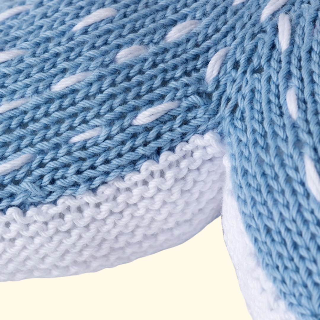 Close up of the completed Savanna Starfish knitted toy showing the textured stitch pattern.