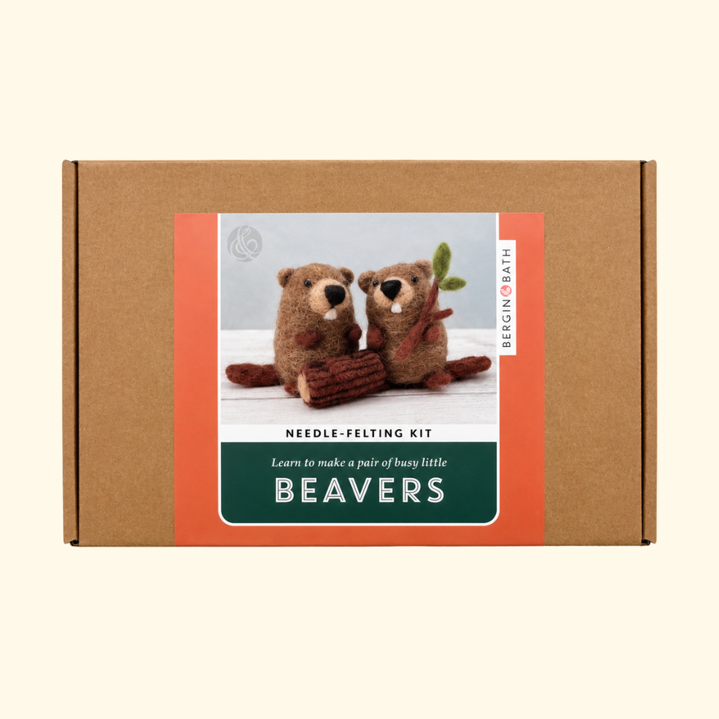 Bergin And Bath Set Of 2 Beavers Needle Felting Kit in kraft cardboard packaging with an illustrated label featuring two brown beavers sitting on a log.
